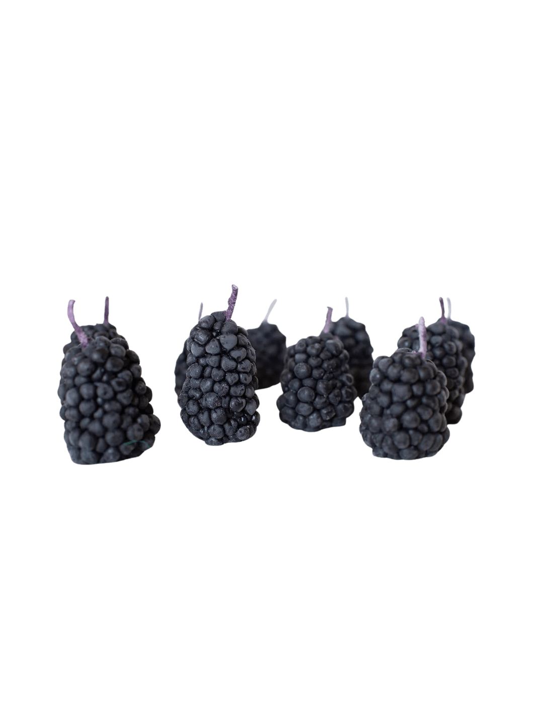 Blackberry-shaped beeswax candles from Happy Organics on a transparent background | Twentyseven Toronto