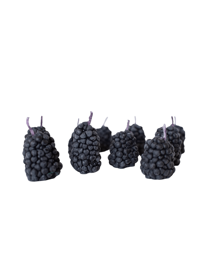Blackberry-shaped beeswax candles from Happy Organics on a transparent background | Twentyseven Toronto