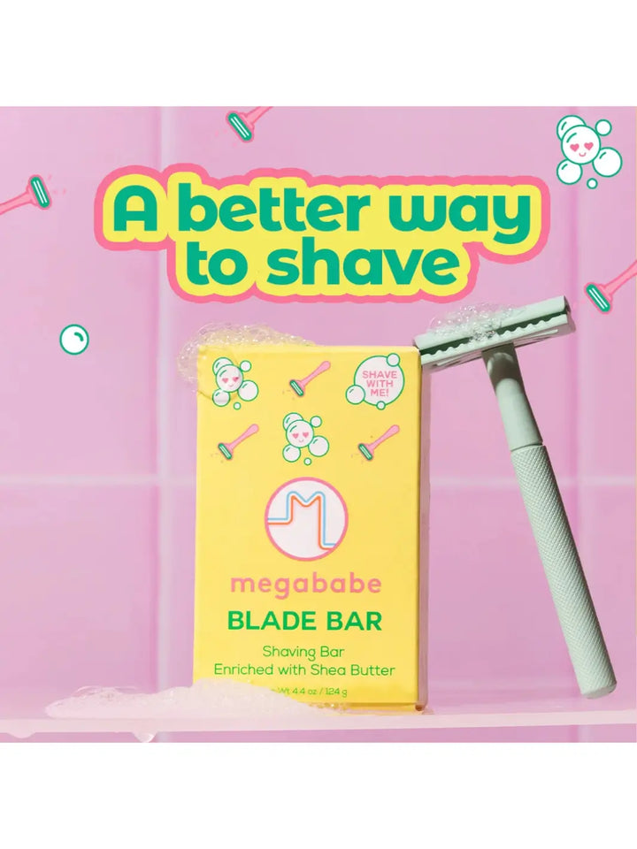 Megababe Blade Bar with text saying 'A better way to shave' in yellow packaging with a green razor on a pink tile background | Twentyseven Toronto