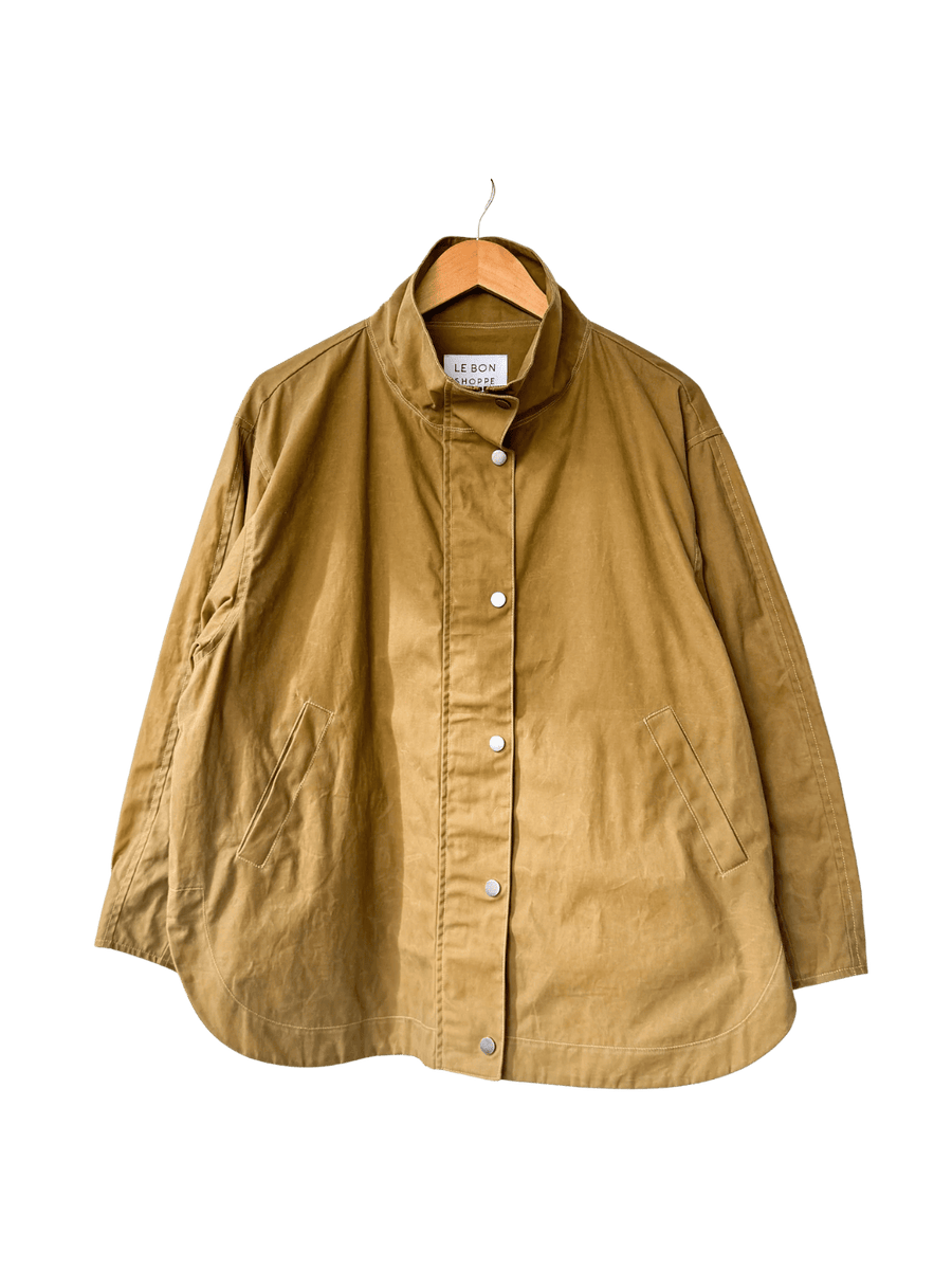 Brown 'Blair Waxed Cotton Jacket' in 'Khaki' from Le Bon Shoppe on a hanger | Twentyseven Toronto