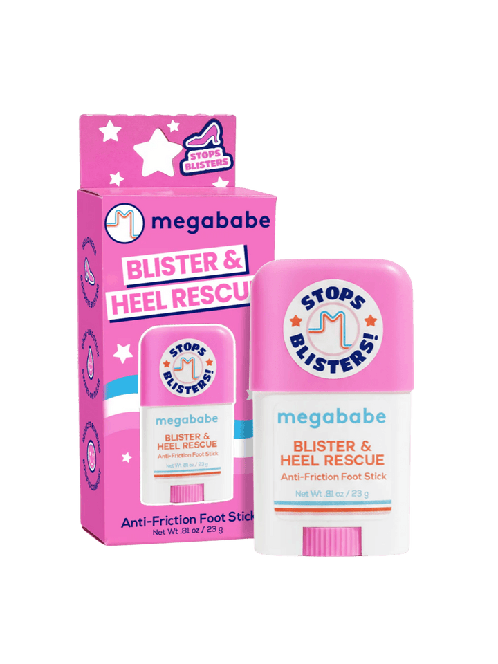 The pink and white stick of Megababe Blister & Heel Rescue stands upright next to its matching pink outer product packaging | Twentyseven Toronto