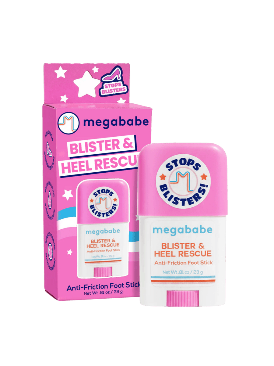 The pink and white stick of Megababe Blister & Heel Rescue stands upright next to its matching pink outer product packaging | Twentyseven Toronto