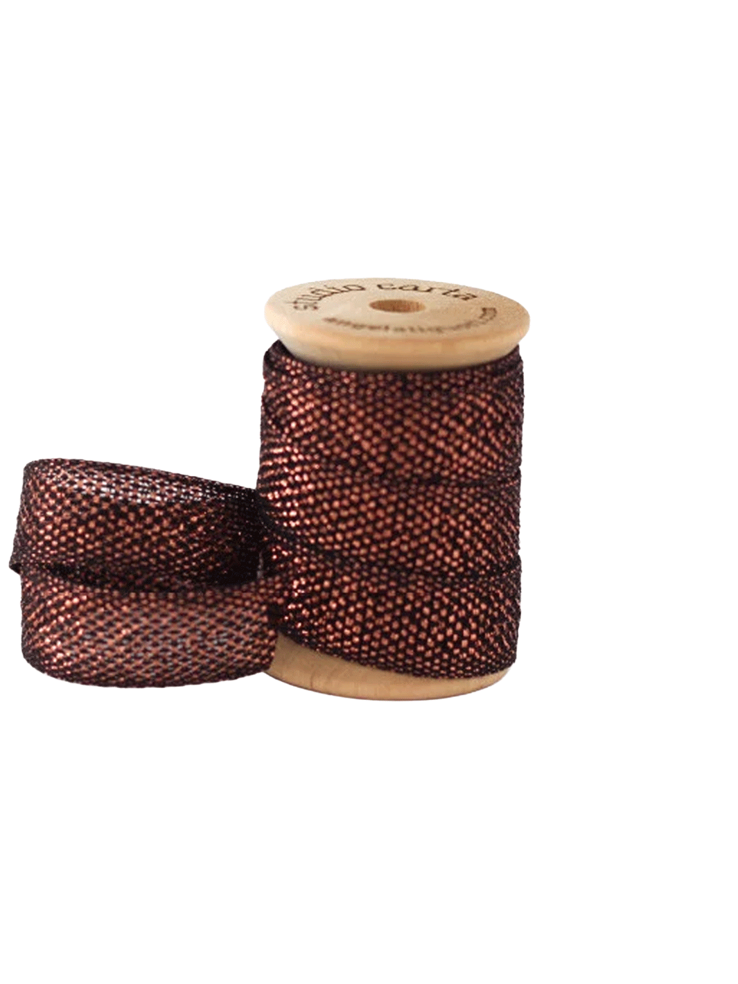 Studio Carta Metallic Loose Weave Ribbon in Black/Copper wrapped around a wooden spool with ribbon unfurled | Twentyseven Toronto