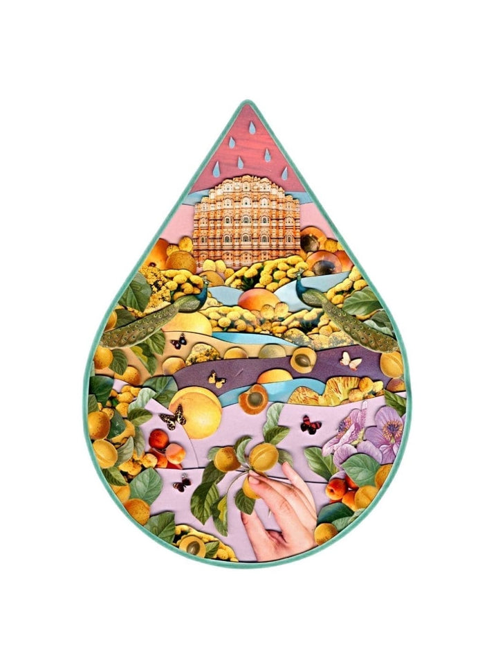 Teardrop-shaped artwork from WOO World of Oils with colorful nature-themed design on a white background | Twentyseven Toronto