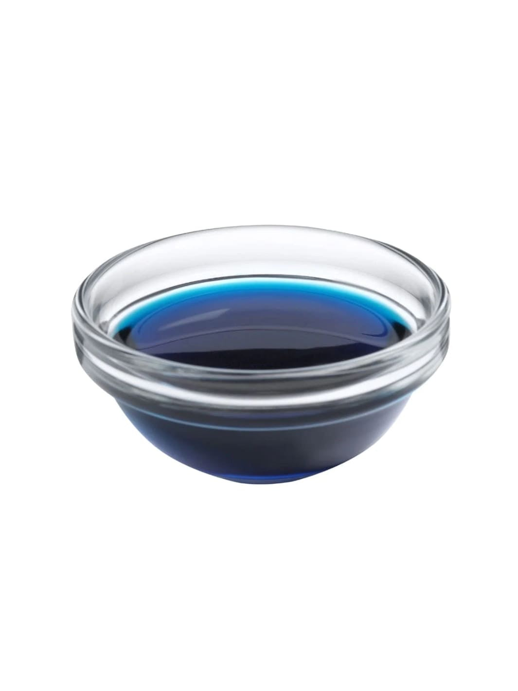 Clear glass bowl filled with blue oil from WOO World of Oils on a white background | Twentyseven Toronto