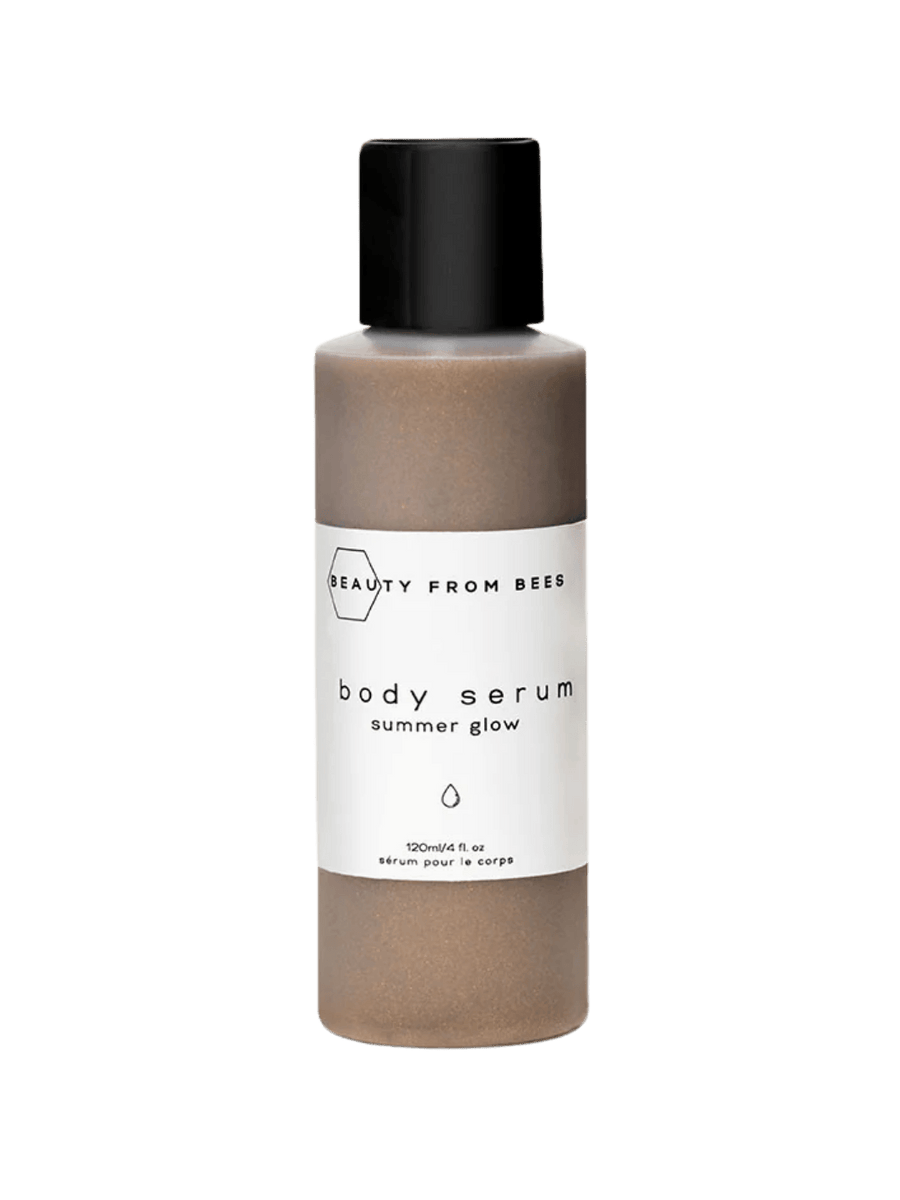 A 120ml bottle of Beauty from Bees Body Serum - Summer Glow filled with shimmery golden liquid | Twentyseven Toronto