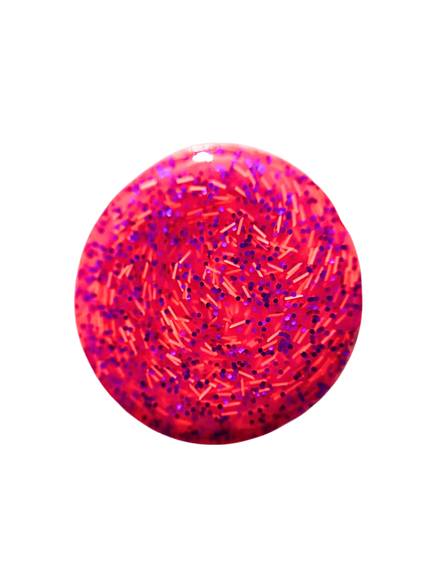 Circular color swatch displays a dollop of Death Valley Nails Bone Daddy Nail Polish, showing its vibrant neon pink jelly base packed with purple hex glitter and orange bar shreds | Twentyseven Toronto