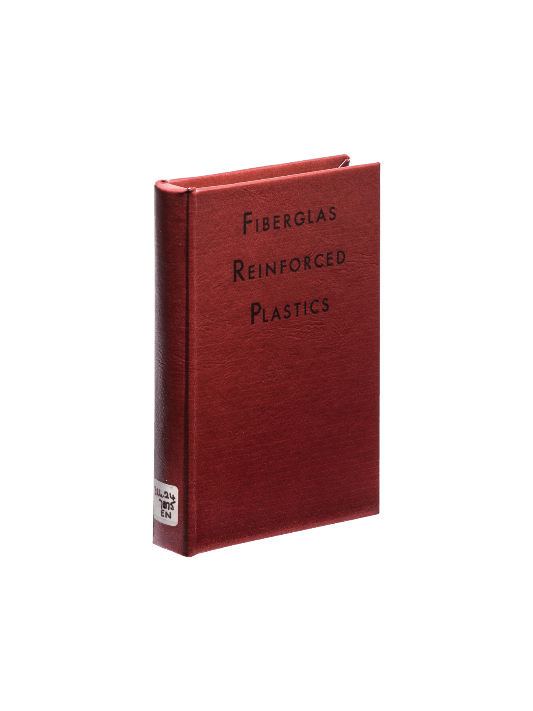 A front view of the red Book Box - Fiberglass Plastics from Puebco standing upright with black ink and a white library classification label on the bottom spine | Twentyseven Toronto