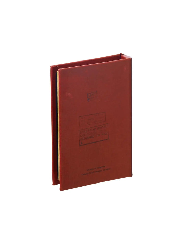 The back cover of a red Book Box - Fiberglass Plastics from Puebco features black library stamps, including text that reads "Library of Congress Catalog Card Number 54-11120." | Twentyseven Toronto