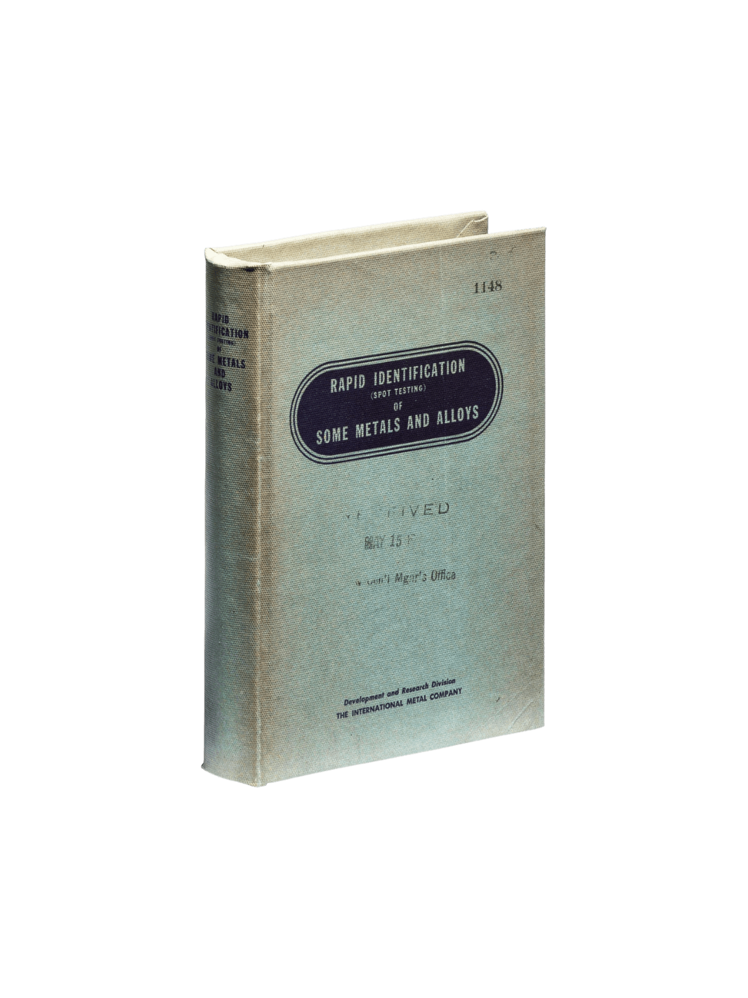 The front cover of the vintage-style Book Box - Metals and Alloys from Puebco features industrial text reading "Rapid Identification of Some Metals and Alloys" against a transparent background | Twentyseven Toronto