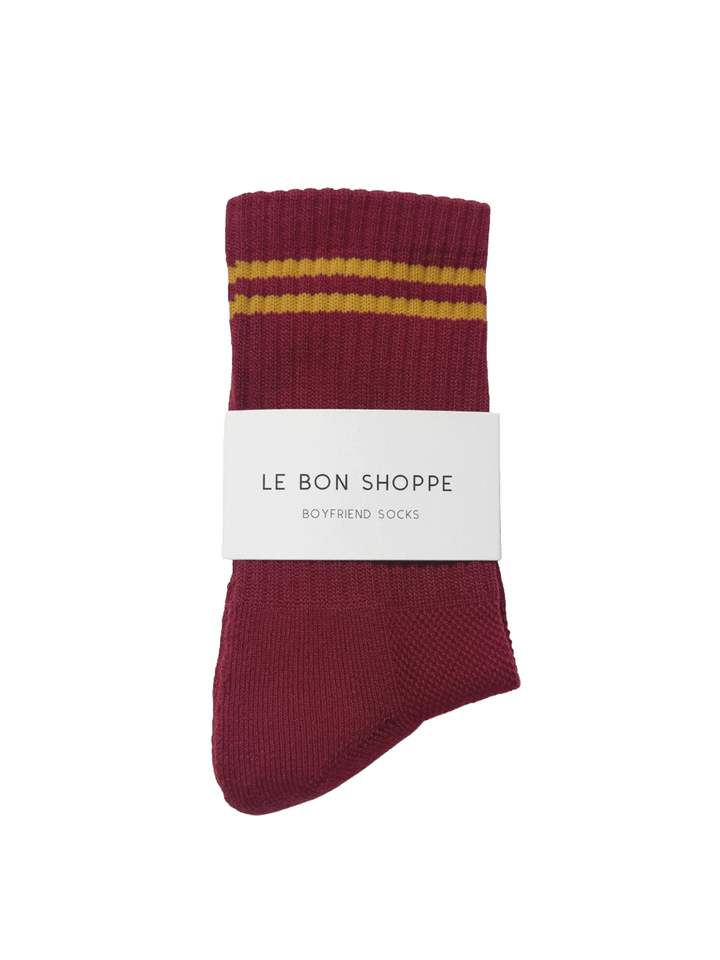 Le Bon Shoppe Boyfriend Socks in Cardinal red with golden yellow contrast stripes and branded packaging | Twentyseven Toronto