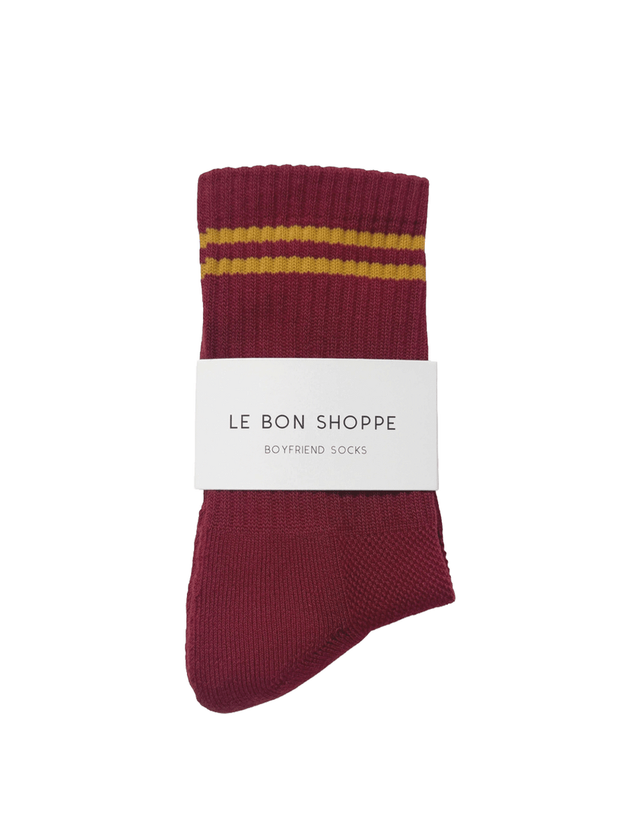 Le Bon Shoppe Boyfriend Socks in Cardinal red with golden yellow contrast stripes and branded packaging | Twentyseven Toronto