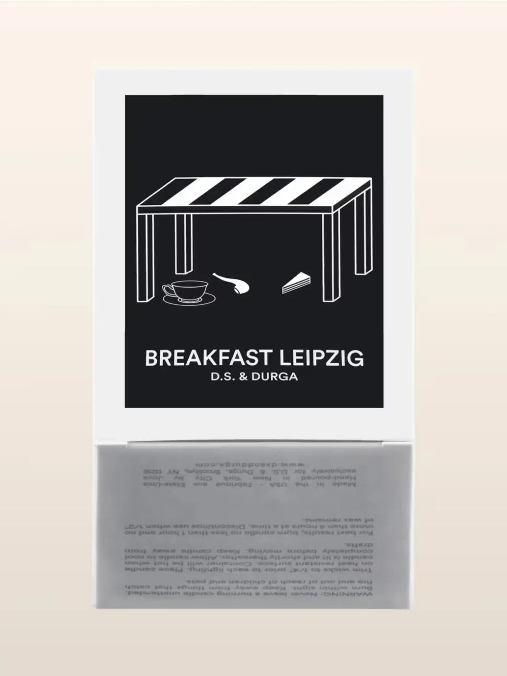 Candle packaging featuring black background and white text featuring 'Breakfast Leipzig' by D.S. & Durga | Twentyseven Toronto