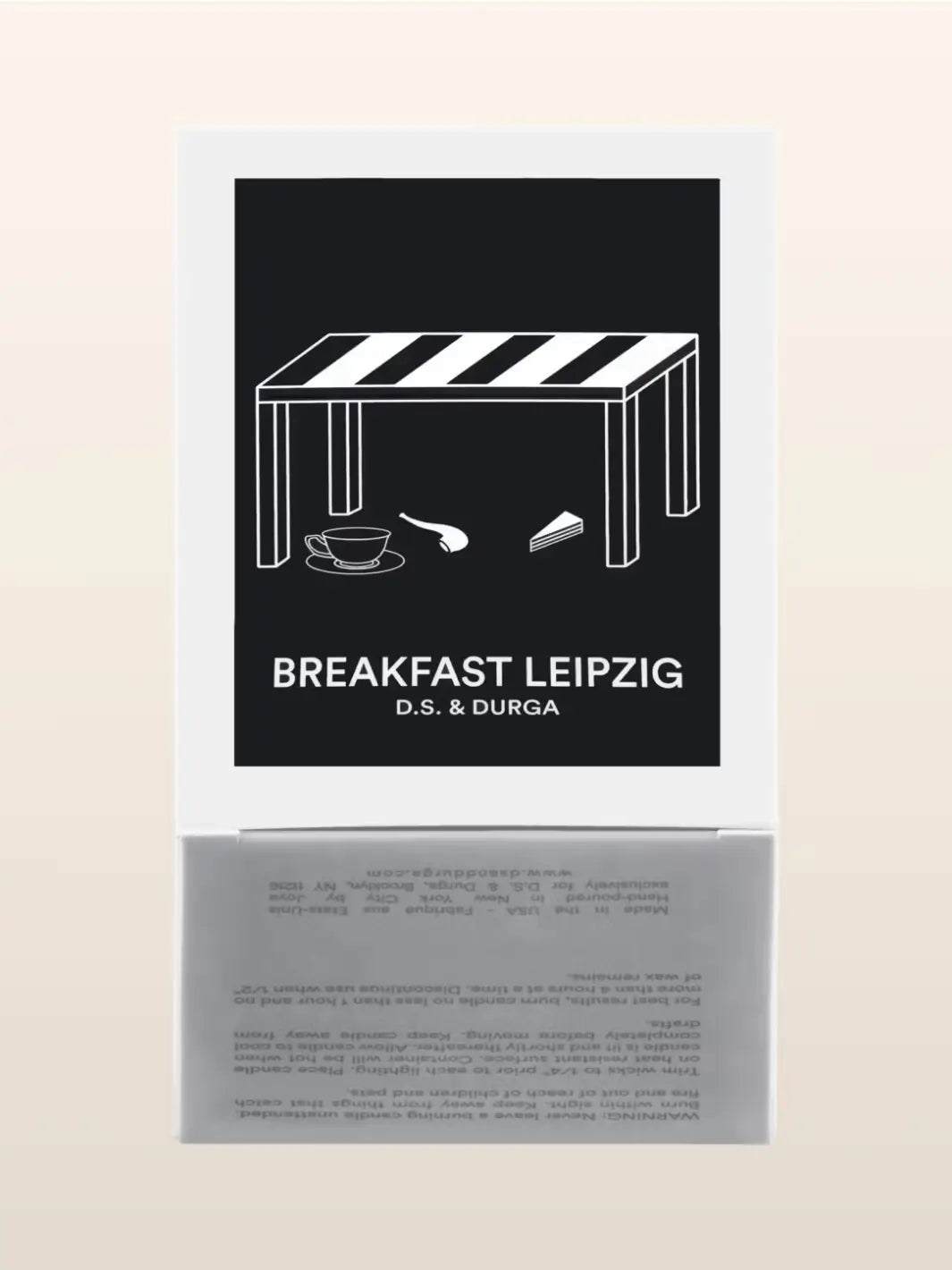 Candle packaging featuring black background and white text featuring 'Breakfast Leipzig' by D.S. & Durga | Twentyseven Toronto
