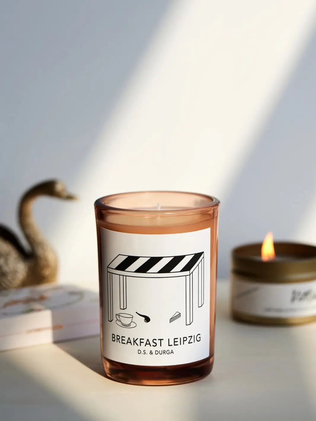 DS&Durga candle with 'Breakfast Leipzig' label on a surface with soft lighting | Twentyseven Toronto