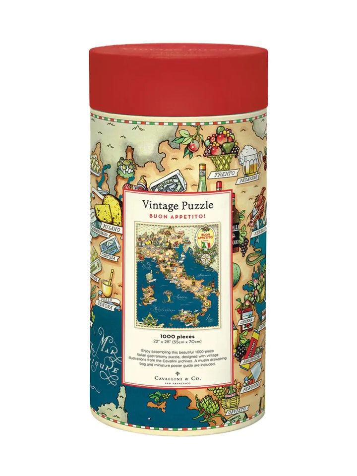 Cylindrical cardboard puzzle packaging for the Cavallini Paper & Co Buon Appetito 1000 Piece Puzzle, featuring a red cap and a colorful vintage map illustration of Italy's regional foods against a white background | Twentyseven Toronto