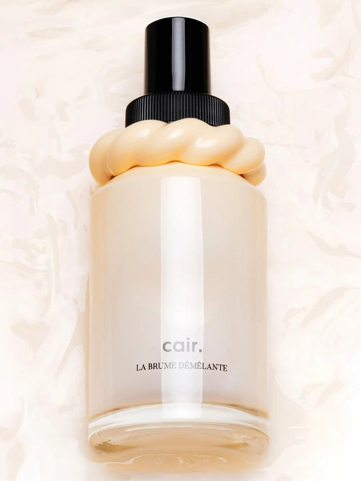 Close-up of Cair Detangling Hair Mist by La Bonne Brosse in its signature pale yellow bottle | Twentyseven Toronto
