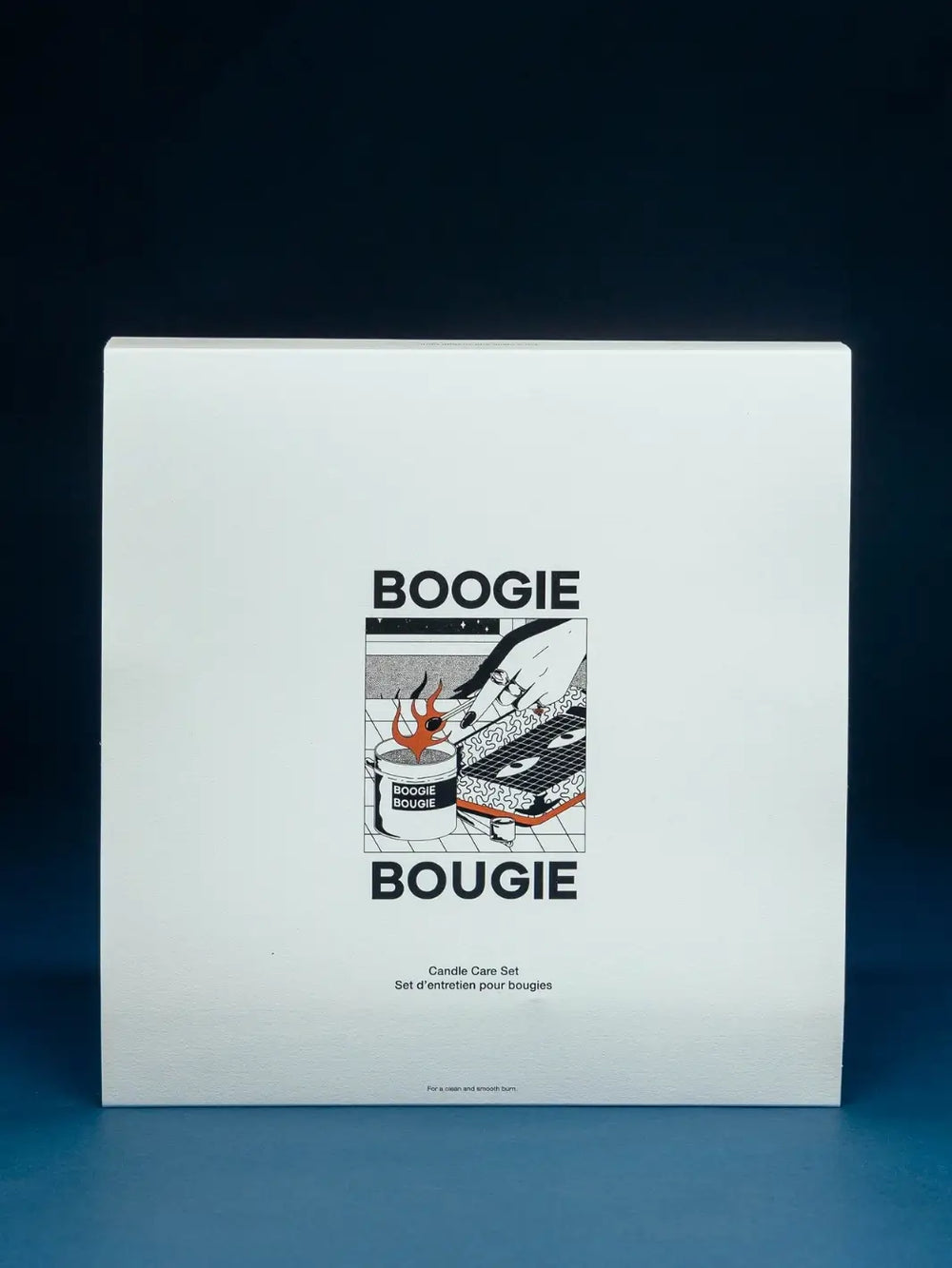 Product packaging for Candle Care Set with 'Boogie Bougie' branding on a dark blue background | Twentyseven Toronto