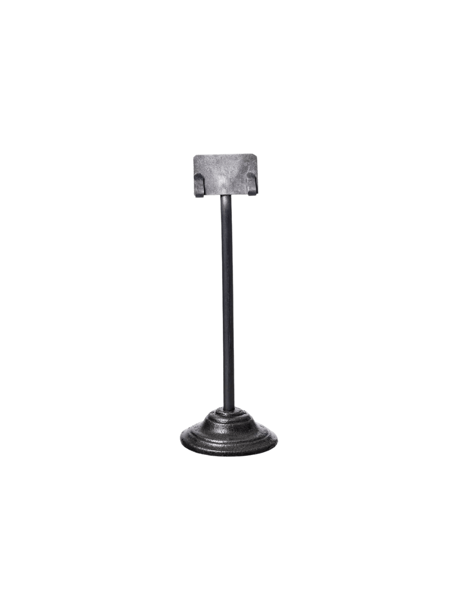 Metal stand Card Holder / H120 from Puebco showcasing its rustic cast-iron base, slender metal stem, and small mounting clips | Twentyseven Toronto