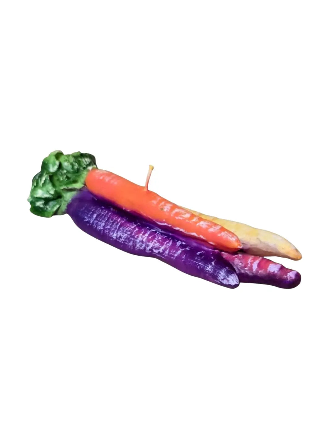 Colourful purple, orange and yellow carrot-shaped candles from Cereria Introna on a white background | Twentyseven Toronto