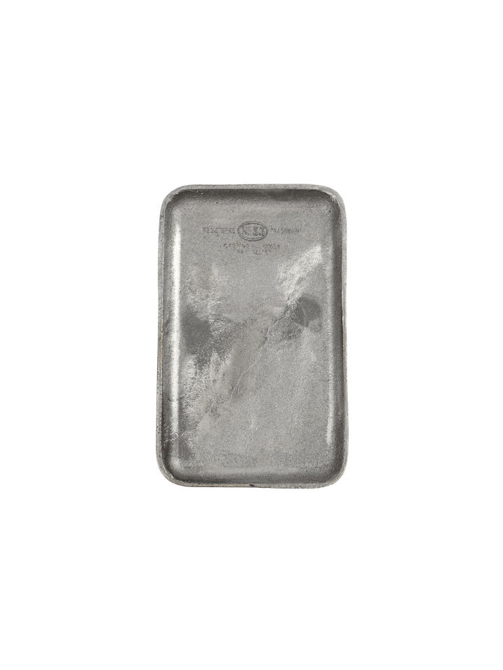Grey Cast Iron Tray from Puebco centered with rounded corners, and subtle vintage stamp on a transparent background | Twentyseven Toronto