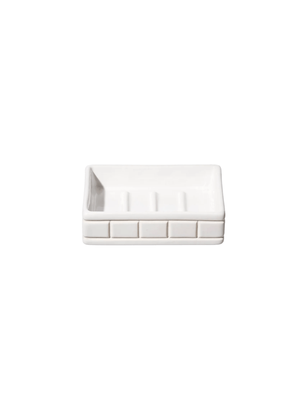 White Ceramic Bath Ensemble / Soap Dish from Puebco, highlighting its raised grid or tile-like exterior pattern | Twentyseven Torotno