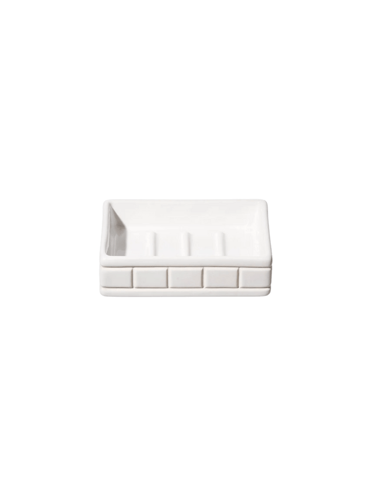 White Ceramic Bath Ensemble / Soap Dish from Puebco, highlighting its raised grid or tile-like exterior pattern | Twentyseven Torotno