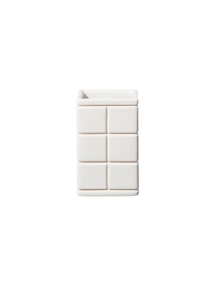 White, rectangular Ceramic Bath Ensemble / Toothbrush Stand from Puebco, featuring a raised grid pattern resembling square bathroom tiles against a transparent background | Twentyseven Toronto