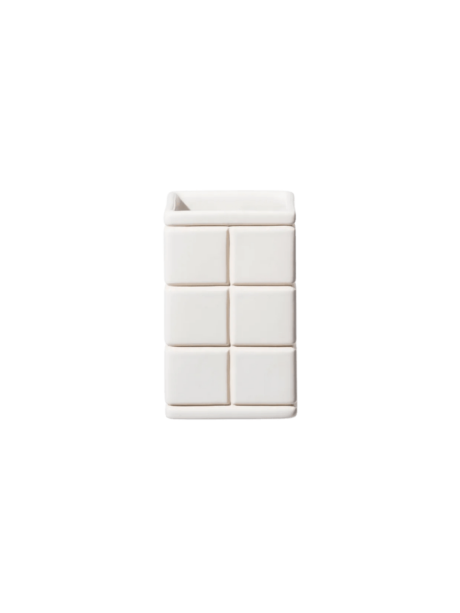 White, rectangular Ceramic Bath Ensemble / Toothbrush Stand from Puebco, featuring a raised grid pattern resembling square bathroom tiles against a transparent background | Twentyseven Toronto