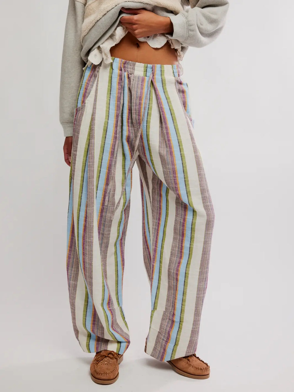 Close up of 'Chambers Laid Back Stripe Pants' in 'Ivory Combo' from Free People on a white background | Twentyseven Toronto