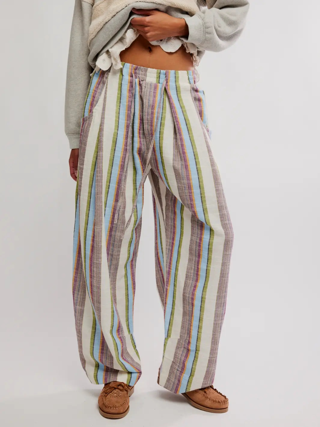 Close up of 'Chambers Laid Back Stripe Pants' in 'Ivory Combo' from Free People on a white background | Twentyseven Toronto
