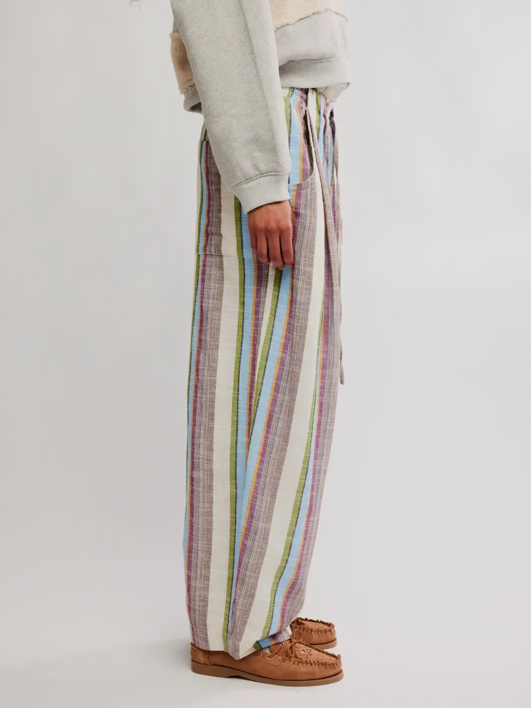 Side view image of 'Chambers Laid Back Stripe Pants' in 'Ivory Combo' from Free People on a white background | Twentyseven Toronto