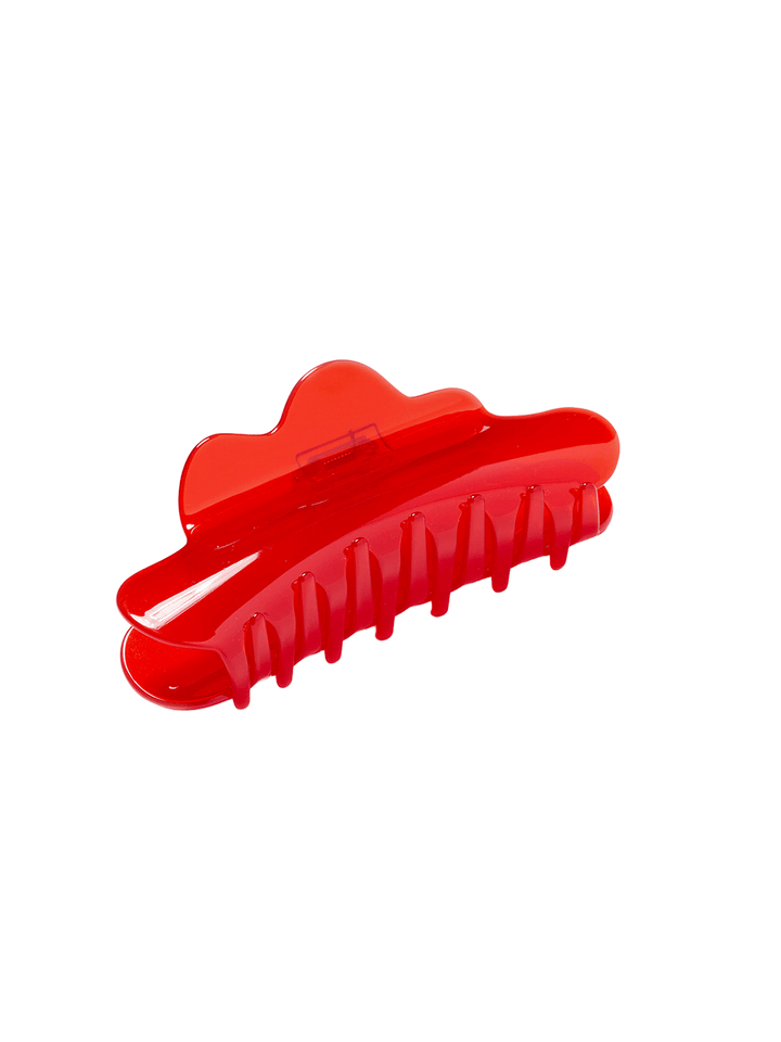 Chunks Nimbus Claw in Candy Red featuring an oversized wavy shape and glossy translucent red finish | Twentyseven Toronto