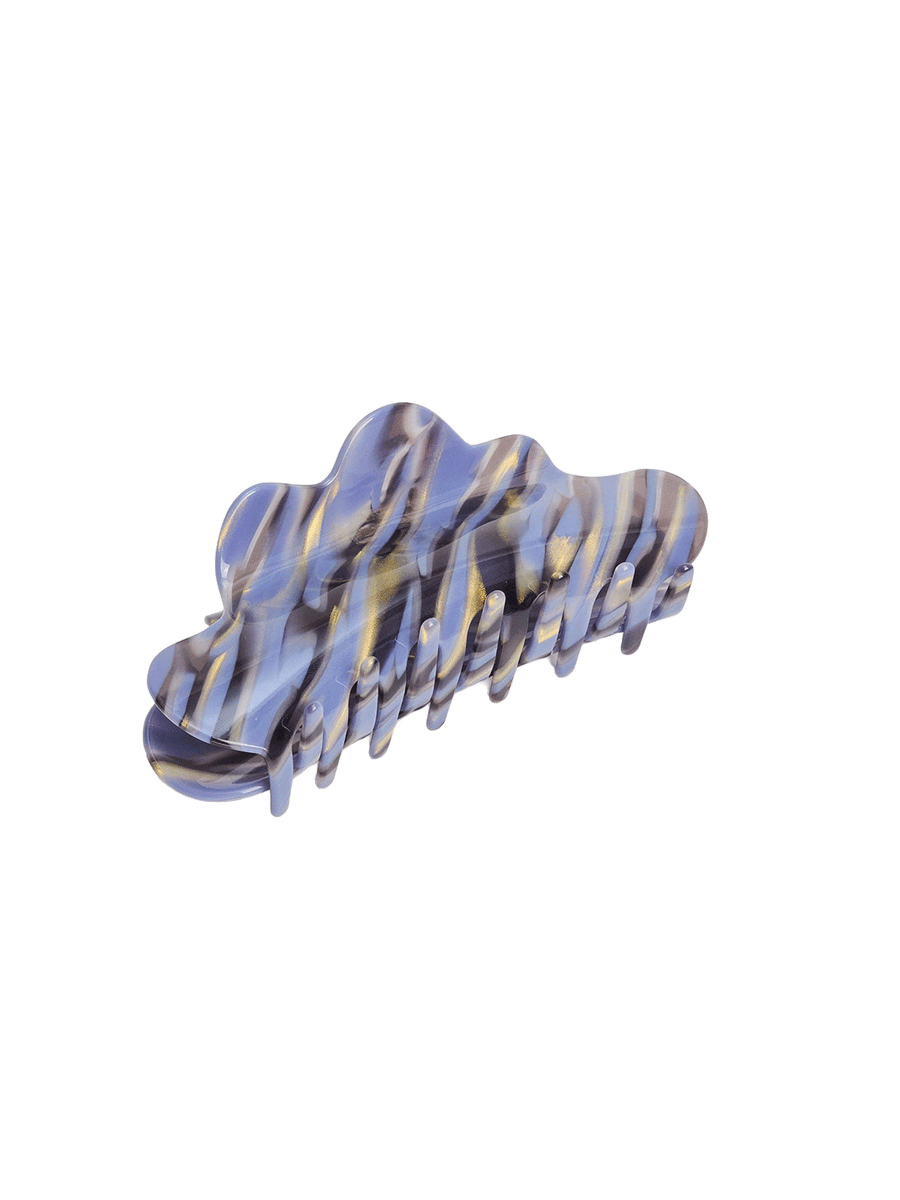 Chunks Nimbus Claw in Phantom featuring a wavy oversized shape with a marbled blue, purple, and gold finish | Twentyseven Toronto