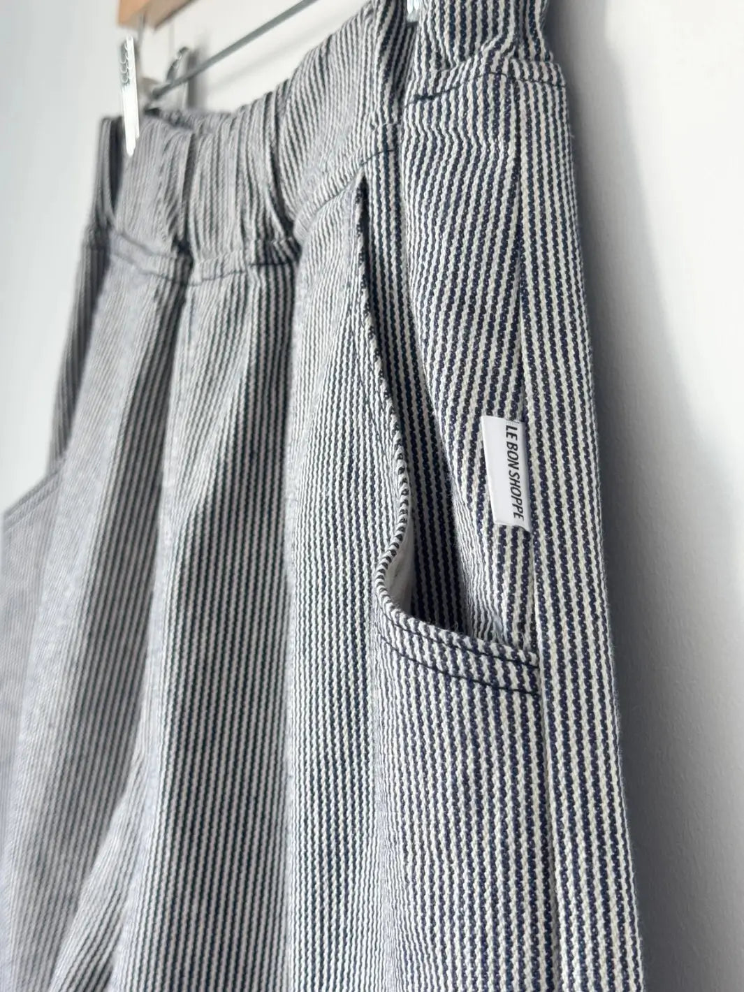 Close up of white 'City Shorts' in 'Blue Stripe' from Le Bon Shoppe | Twentyseven Toronto