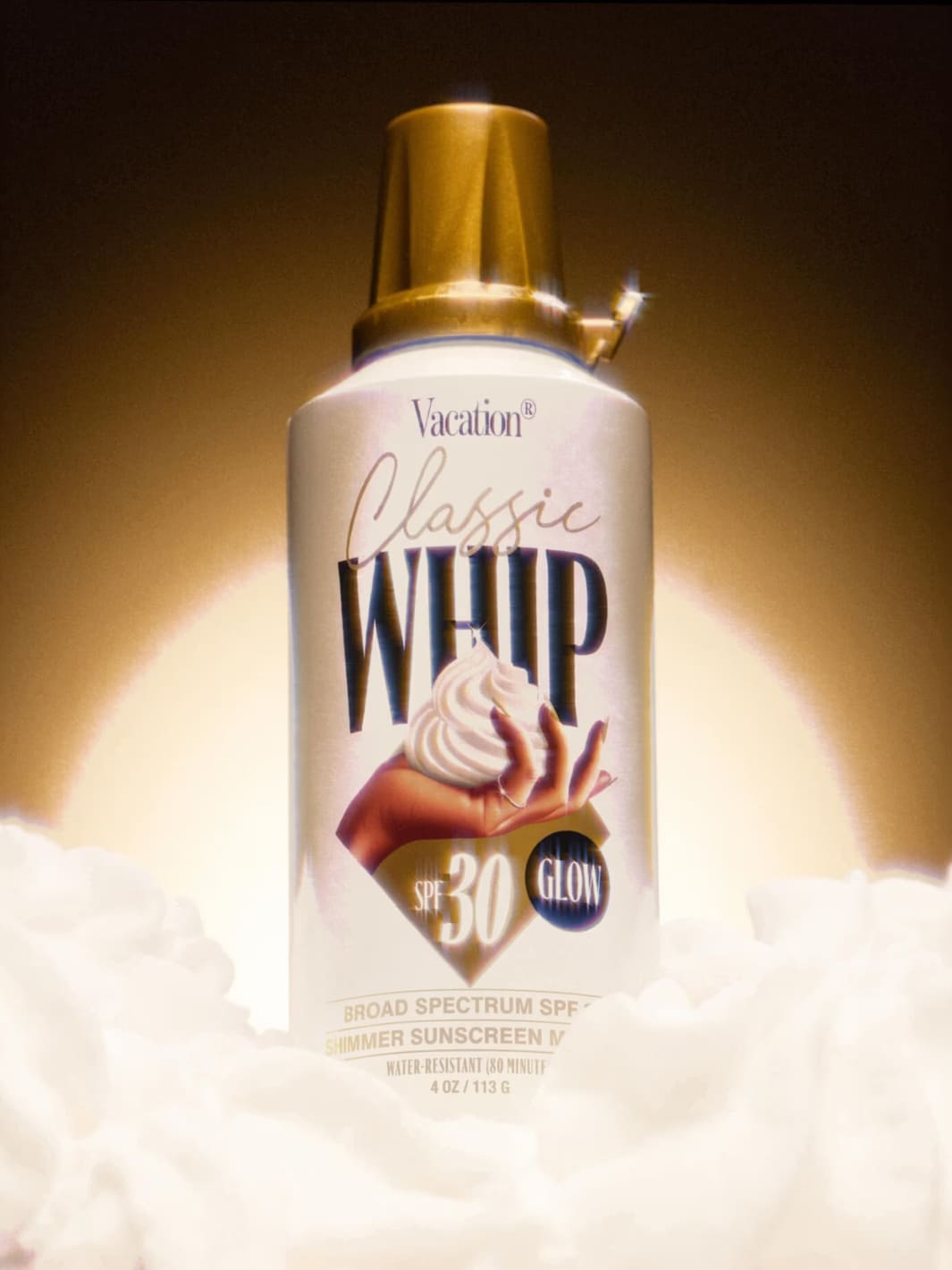 Vacation Inc. Classic Whip Glow SPF 30 | Twentyseven Toronto | Sunscreen spray bottle labeled 'Classic Whip' with whipped cream graphic on a beige background