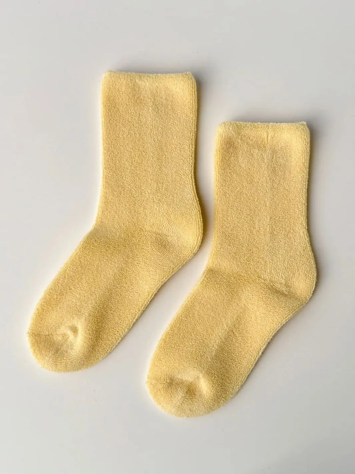 Pair of yellow Cloud Socks in 'Lemon Water' from Le Bon Shoppe, flatlay | Twentyseven Toronto
