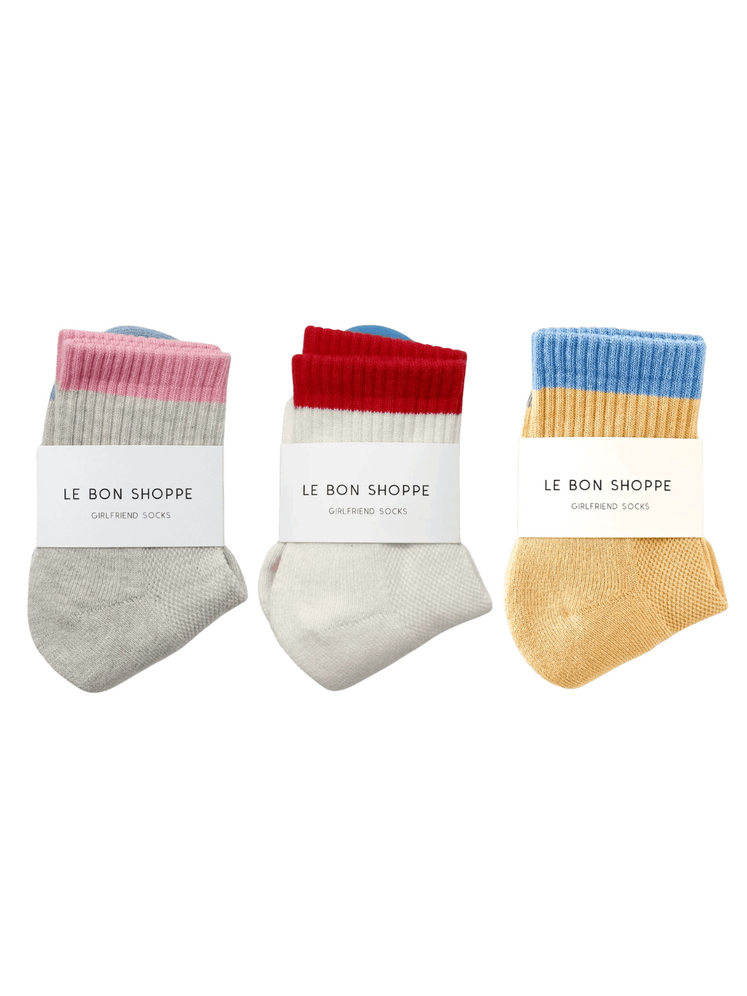 Three pairs of 'Color Block Girlfriend Socks' with 'Le Bon Shoppe' labels on a transparent background | Twentyseven Toronto