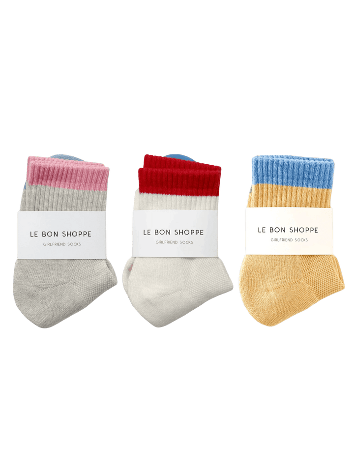 Three pairs of 'Color Block Girlfriend Socks' with 'Le Bon Shoppe' labels on a transparent background | Twentyseven Toronto