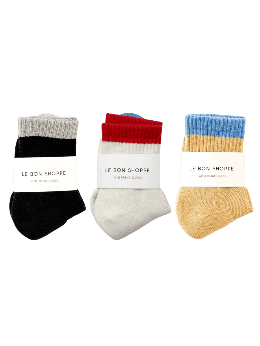 Three pairs of 'Color Block Girlfriend Socks' with 'Le Bon Shoppe' labels on a transparent background | Twentyseven Toronto