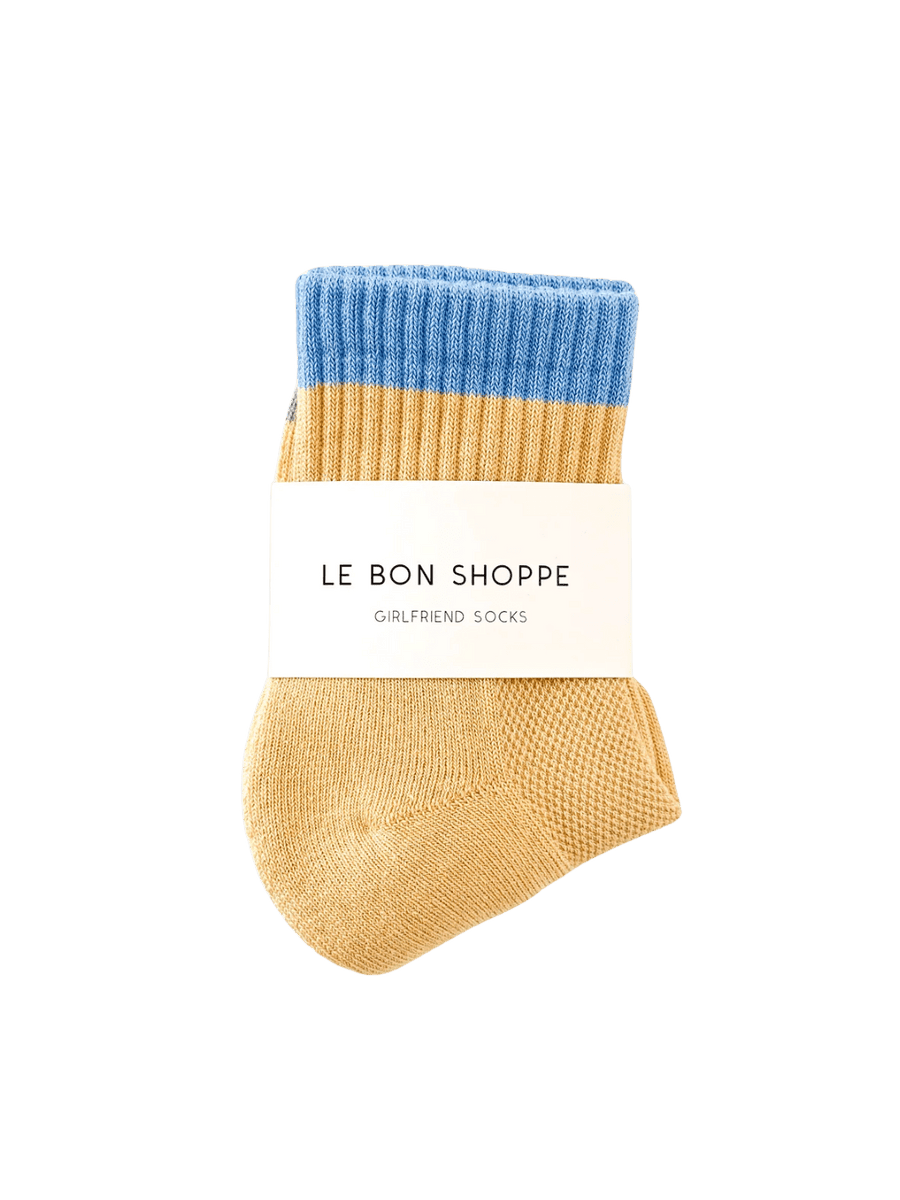 Yellow and sky blue 'Color Block Girlfriend Socks' in 'Yellow Blue' style with 'Le Bon Shoppe' label on a transparent background | Twentyseven Toronto