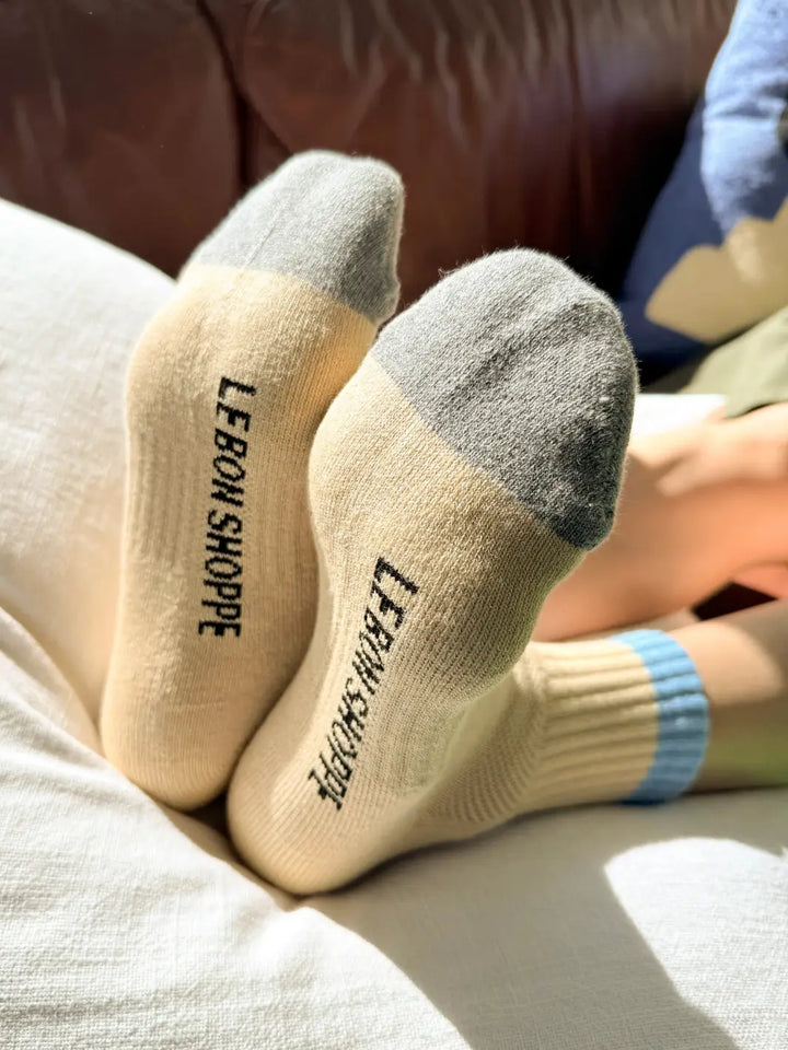 Yellow 'Color Block Girlfriend Socks' in 'Yellow Blue' style with gray toes and 'Le Bon Shoppe' lettering on the bottom | Twentyseven Toronto