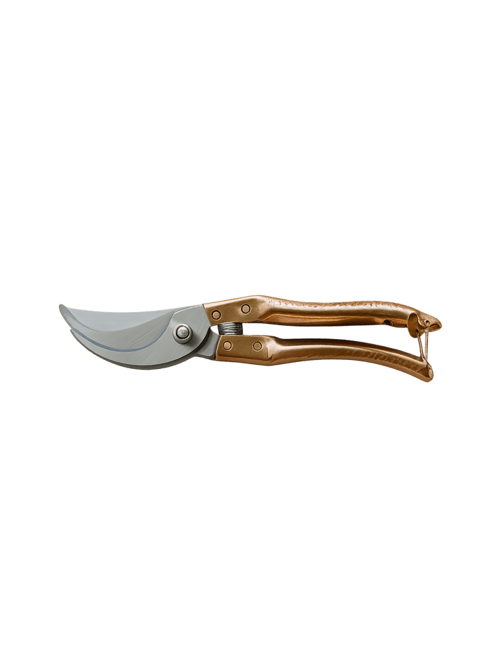 A single pair of Copper Handle Garden Secateurs from Laura Hooper Design House is shown from a side profile against a transparent background | Twentyseven Toronto