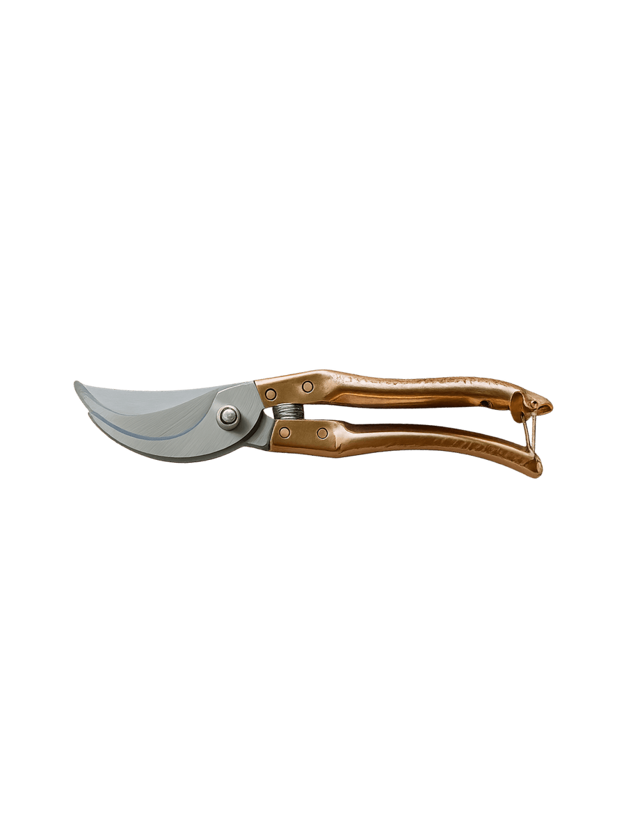 A single pair of Copper Handle Garden Secateurs from Laura Hooper Design House is shown from a side profile against a transparent background | Twentyseven Toronto