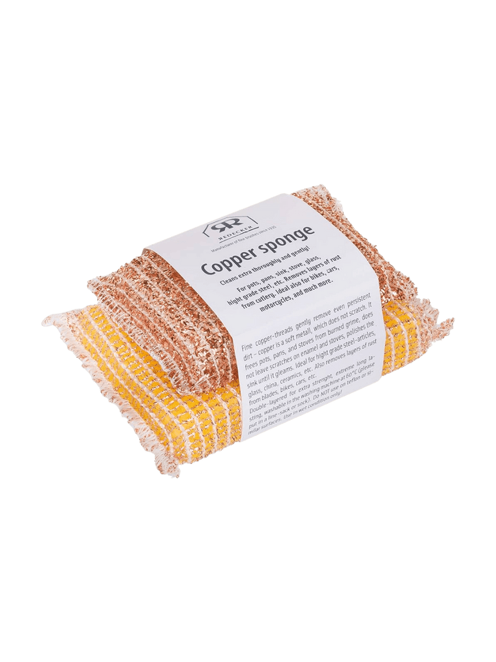 2 copper sponges from Burstenhaus Redecker with white label on a transparent background | Twentyseven Toronto