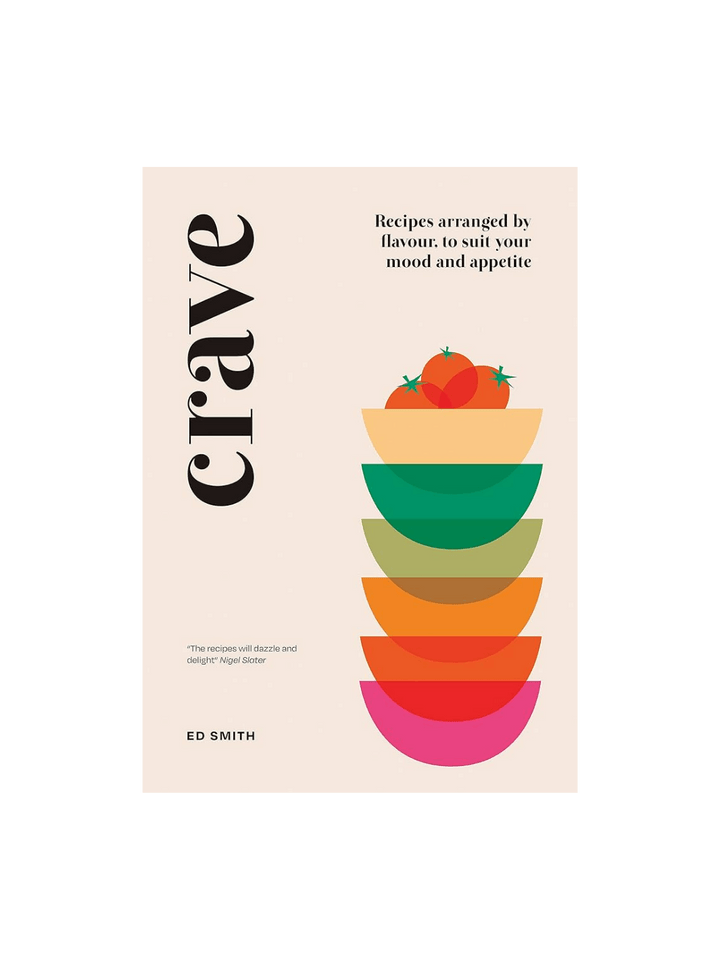 Book cover of Crave: Recipes Arranged by Flavour, to Suit Your Mood and Appetite by Ed Smith features a minimalist design with six colorful stacked bowls topped with three red tomatoes against a pale pink background | Twentyseven Toronto