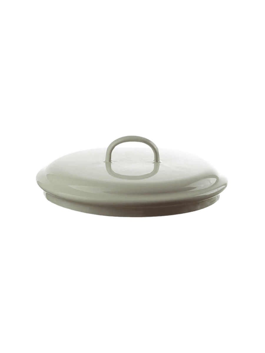 Round, cream enamel lid with a curved loop handle on top, featuring the Munder Email Cream Lid, 20 cm | Twentyseven Toronto