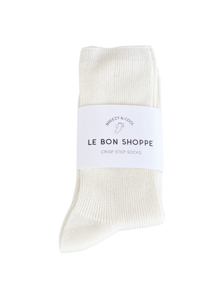 White 'Crisp Step Socks' with a 'Le Bon Shoppe' label on a transparent background | Twentyseven Toronto