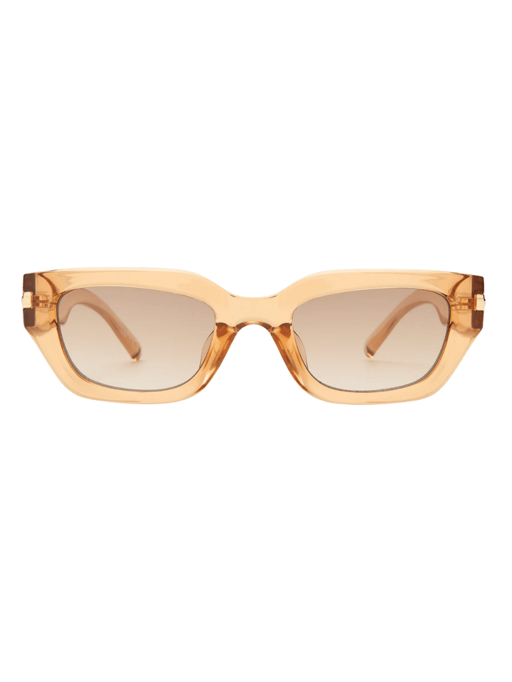 Product shot of gold-rimmed Le Specs Cubito + | Sand sunglasses centered against a transparent background | Twentyseven Toronto