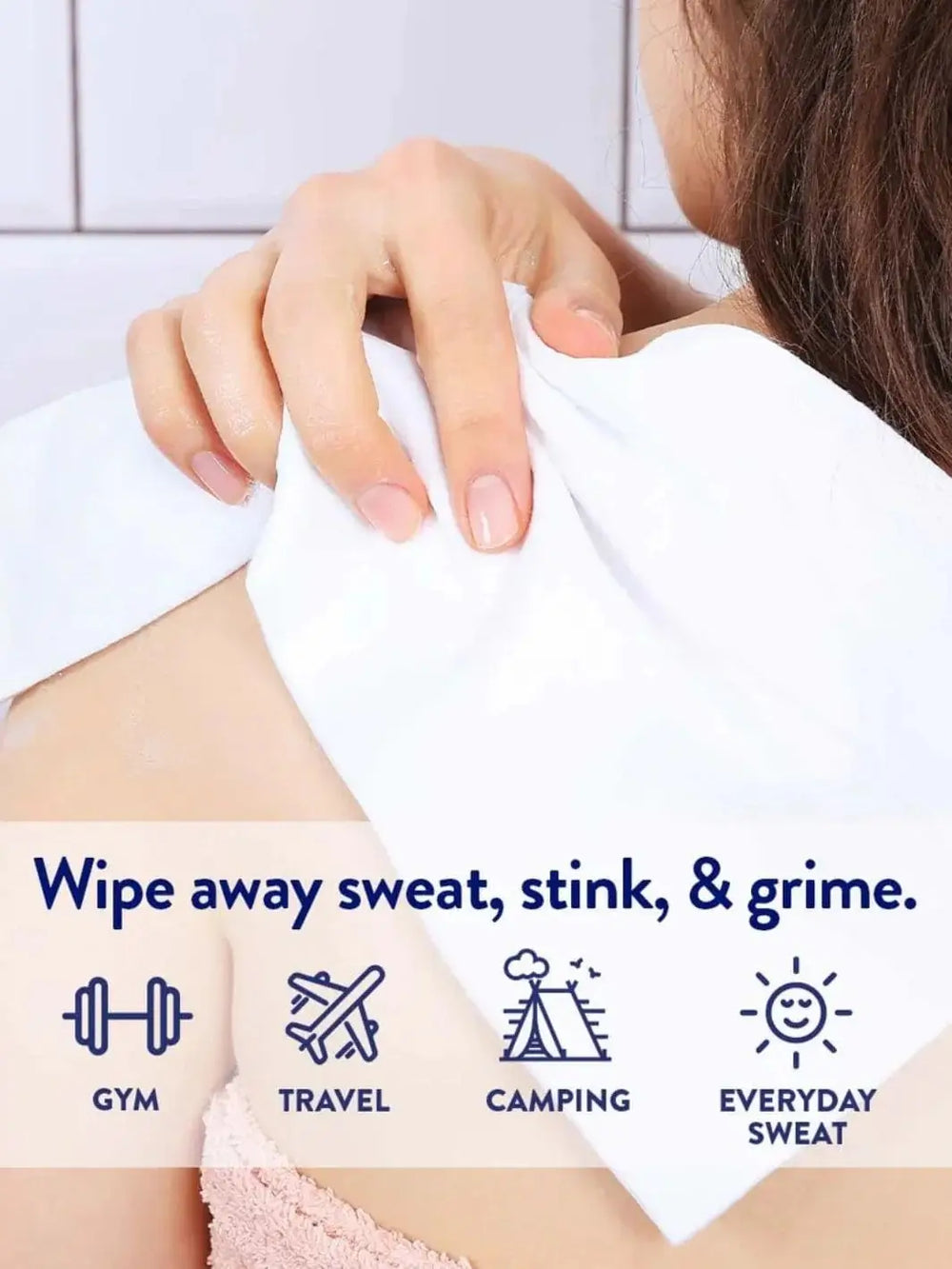 A close-up shot shows a hand using a white body cloth over a person's shoulder to highlight the everyday cleansing versatility of the Mason Pearson Cucumber Mint Shower Sheets | Twentyseven Toronto